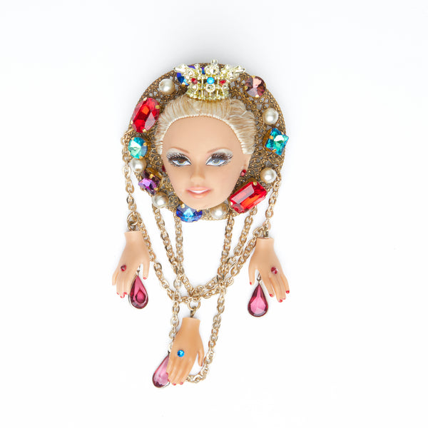 regal blond hair doll face brooch with gemstones