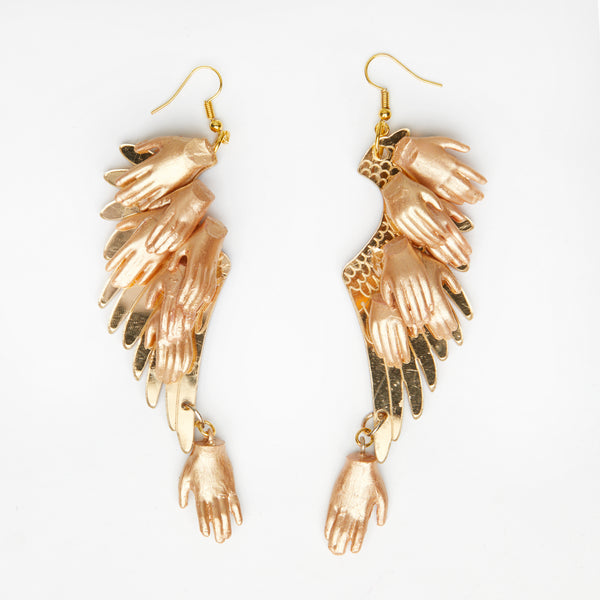 Icarus wing earrings -gold dolls hands