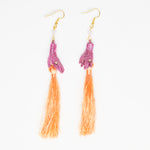 pink dolls hands earrings with salmon pink silky tassels