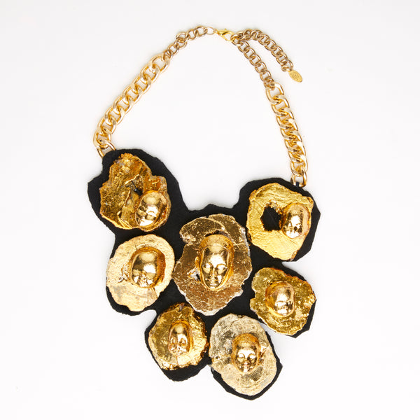 gold doll face on gold nugget crystal necklace