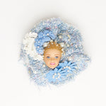 blond hair doll face on blue tweed fabric Chanel style