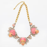 3 pink hair dolls face necklace
