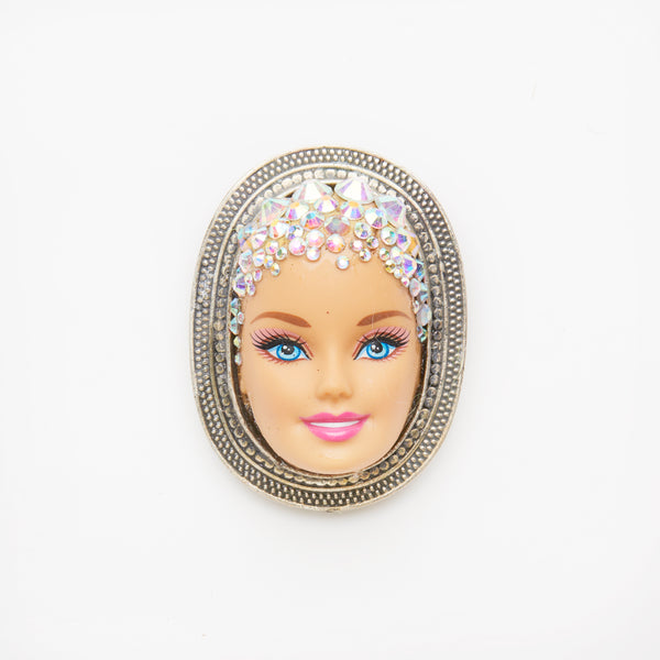 doll face silver brooch with rhinestones