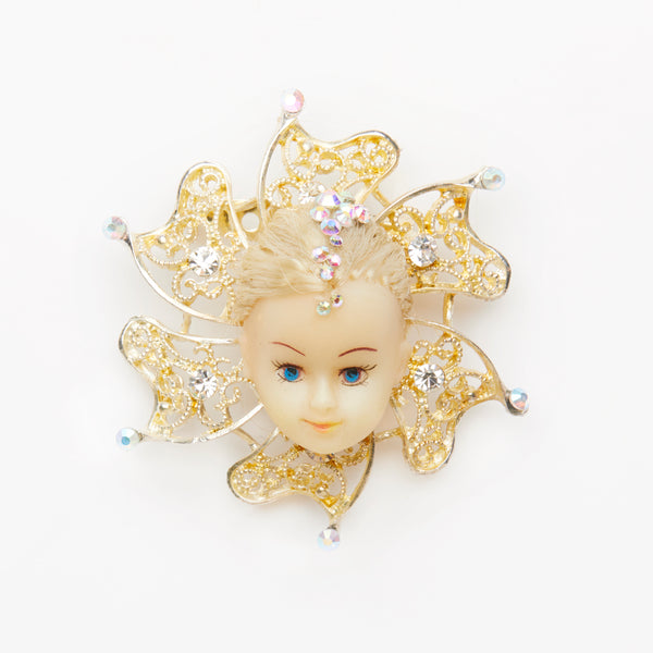 flower shape doll face silver brooch with rhinestones