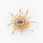 miniature baroque halo doll eye brooch