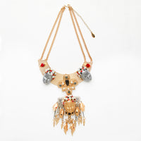 gold & silver doll  face necklace on gold & silver metallic base