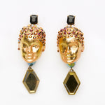 gold dolls heads earrings with iridescent stones