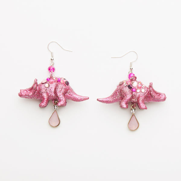 pink iridescent triceratops dinosaur earrings with teardrop beads