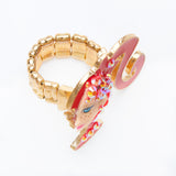 miniature profile doll with iconic red pony tale