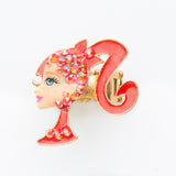 miniature profile doll with iconic red pony tale