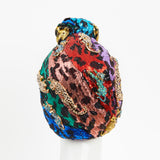 leopard print turban with leopard jewellery