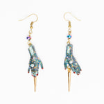 golden spike earrings with  glittery dolls hands