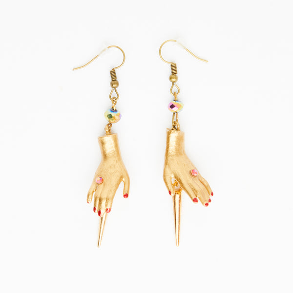 golden spike earrings with gold dolls hands