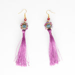 dolls  blinking eyes with  purple tassels earrings